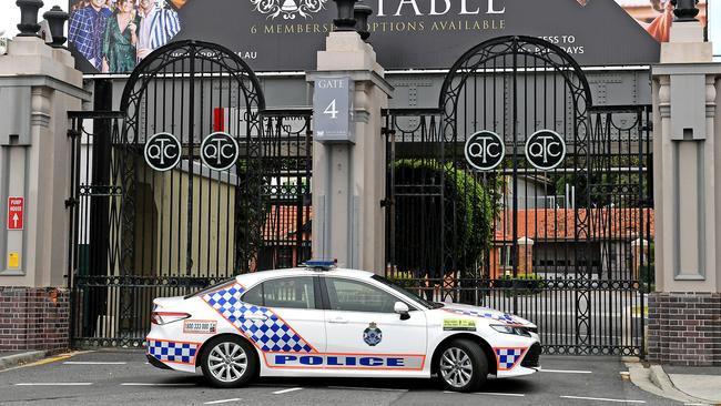 Police outside the Eagle Farm racecourse, which was temporarily closed after a bomb scare on Saturday.