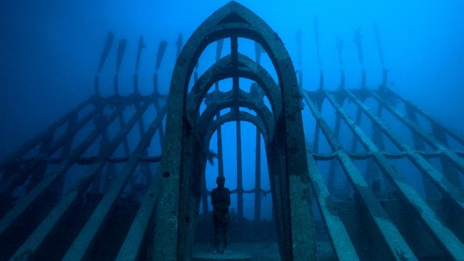 Sculptor Jason DeCaires Taylor's underwater sculptures on display at the John Brewer Reef.