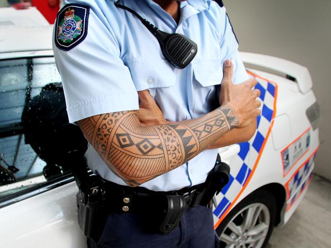 NEWS BSM 8/4/2011 Queensland Police will soon have to cover their tattoos when on duty . !!!!NO BYLINE!!!