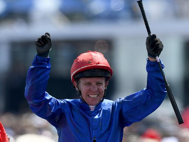 Kerrin McEvoy celebrates after winning the 2018 Melbourne Cup. Picture: AAP Images