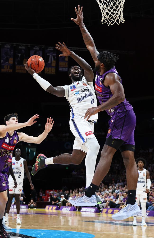 36ers star Montrezl Harrell gets up as Kings’ Cameron Oliver defends. Picture: Getty Images