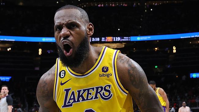 ATLANTA, GEORGIA - DECEMBER 30:  LeBron James #6 of the Los Angeles Lakers reacts after drawing a foul on a basket against the Atlanta Hawks during the fourth quarter at State Farm Arena on December 30, 2022 in Atlanta, Georgia.  NOTE TO USER: User expressly acknowledges and agrees that, by downloading and or using this photograph, User is consenting to the terms and conditions of the Getty Images License Agreement.  (Photo by Kevin C. Cox/Getty Images)