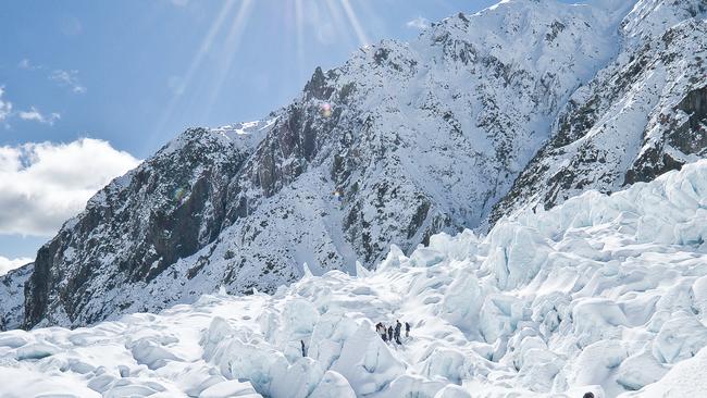 Tourists on a guided tour on the Franz Josef Glacier.