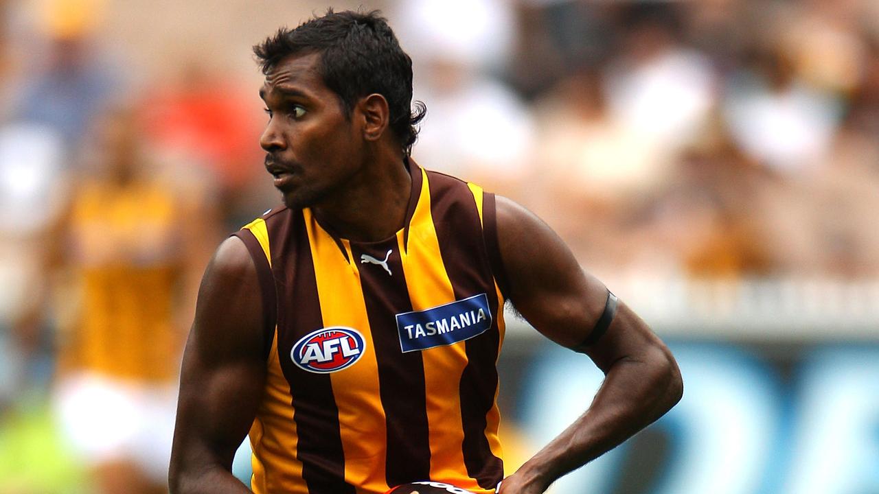 MELBOURNE, AUSTRALIA - MARCH 27: Carl Peterson of the Hawks looks for a teammate during the round one AFL match between the Melbourne Demons and the Hawthorn Hawks at Melbourne Cricket Ground on March 27, 2010 in Melbourne, Australia. (Photo by Mark Dadswell/Getty Images)