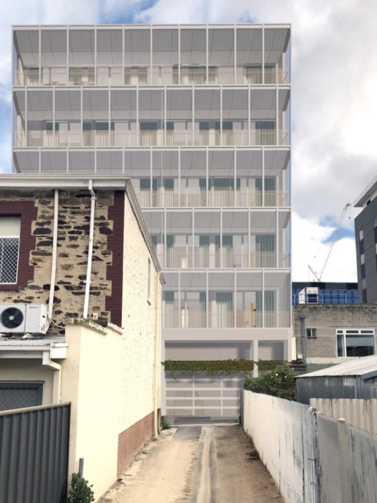 An artist impression of a proposed six-storey development with a cafe and apartments for Carrington Street, Adelaide. Picture: Supplied
