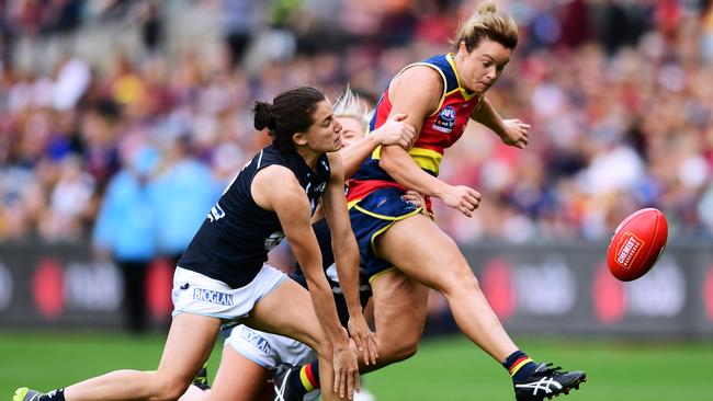 Crows’ defender Courtney Cramey kicks under pressure during the 2019 AFLW grand final against Carlton at Adelaide Oval on March 31. Picture: Mark Brake/Getty Images