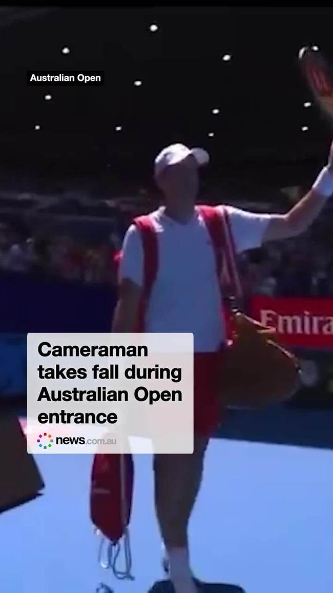 Cameraman takes fall during Australian Open entrance