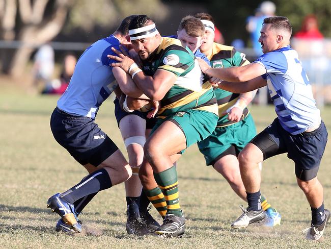 Surfers Paradise’s Sake Folaumoetui takes on the Helensvale defence in Saturday’s preliminary final. Picture: Richard Gosling