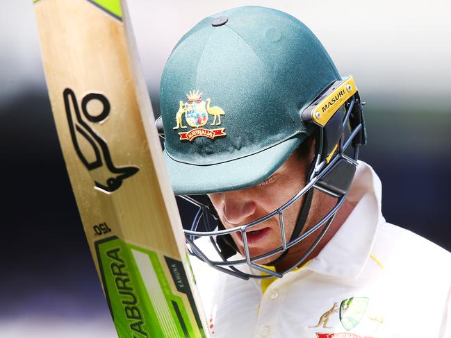 MELBOURNE, AUSTRALIA - DECEMBER 28: Tim Paine of Australia looks dejected after defeat after his dismissal during day three of the Third Test match in the series between Australia and India at Melbourne Cricket Ground on December 28, 2018 in Melbourne, Australia. (Photo by Michael Dodge/Getty Images)