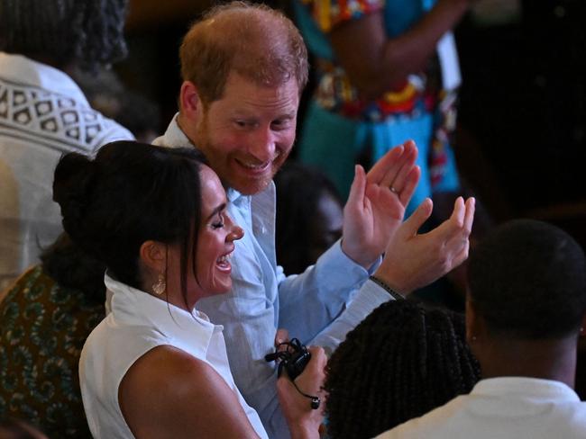 The couple appeared extremely close during the trip. Picture: AFP