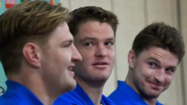 New Zealand's Barrett brothers Jordie (L), Scott (C) and Beauden (R) attend a press conference in Beppu on September 25, 2019, during the Japan 2019 Rugby World Cup. (Photo by Christophe SIMON / AFP)