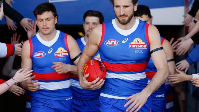 BALLARAT, AUSTRALIA - AUGUST 25: Marcus Bontempelli of the Bulldogs leads his team on to the field during the 2024 AFL Round 24 match between the Western Bulldogs and the GWS GIANTS at Mars Stadium on August 25, 2024 in Ballarat, Australia. (Photo by Dylan Burns/AFL Photos via Getty Images)