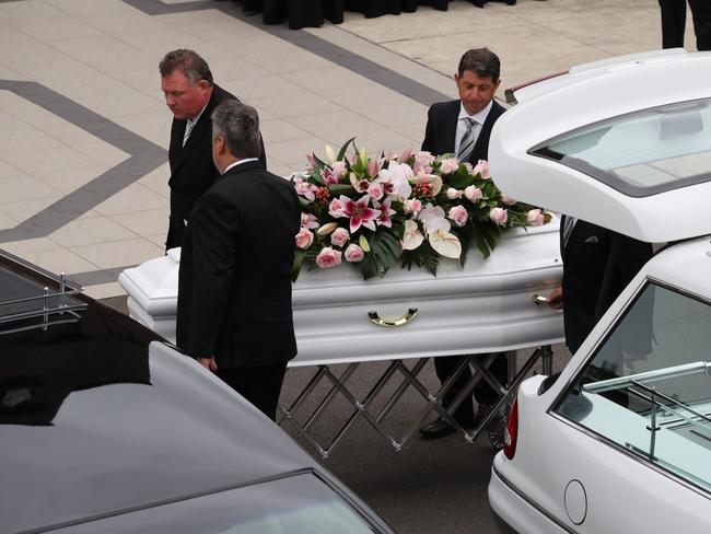 Annabelle’s coffin is carried into the church. Picture: David Swift.