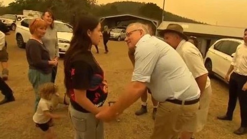 Zoey Salucci-McDermott accused Scott Morrison of “walking away” from her when he visitedCobargo on Thursday, after she told him she would not shake his hand unless he committed more money to the town’s rebuild and the Rural Fire Service. Picture: 9 News