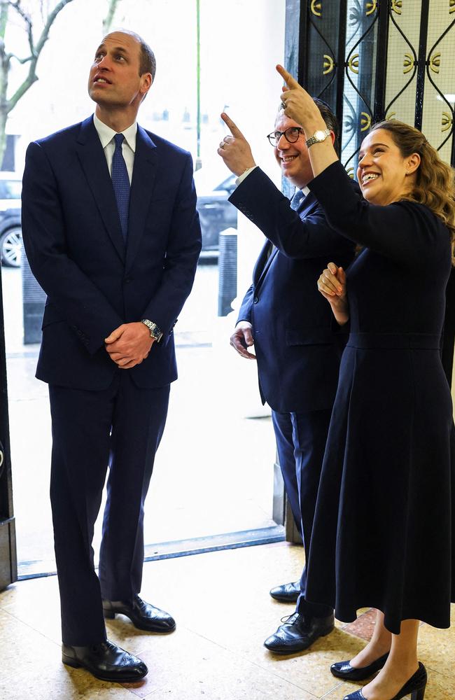 Rabbi Daniel Epstein and his wife Ilana show Prince William sections of the synagogue during a visit to the Western Marble Arch Synagogue, in London. Picture: AFP