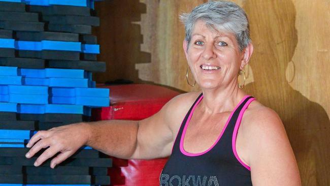 WAKE-UP CALL: Breast cancer survivor Catherine Hayter has lost a significant amount of weight  and now teaches the fitness class she says changed her life, Bokwa. Picture: Mike Richards GLA160818SURV