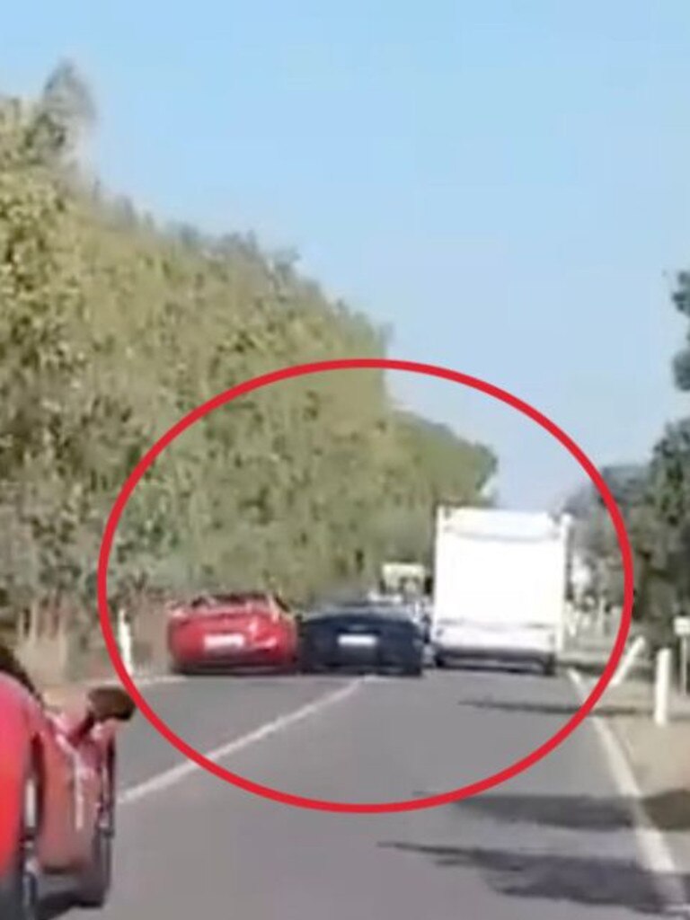 The moment the two supercars clipped each other and hit the camper van causing the huge deadly crash. Picture: Jam Press