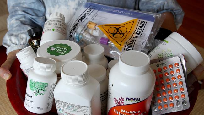 A tray full of the medicines and supplements Alison Day takes every day. Picture: Toby Zerna