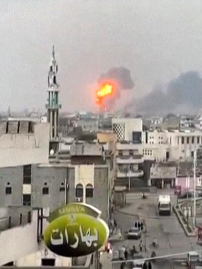 Smoke billowing above Yemen's rebel-held Hodeida port city following Israeli strikes. Picture: AFP/UGC