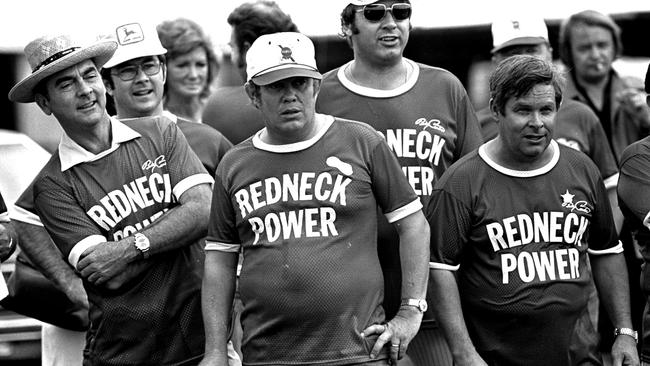 Billy Carter stands among teammates during a softball game in Florida. He made an appearance at the charity, fundraising weekend for a fee of $US10,000. Picture: AP