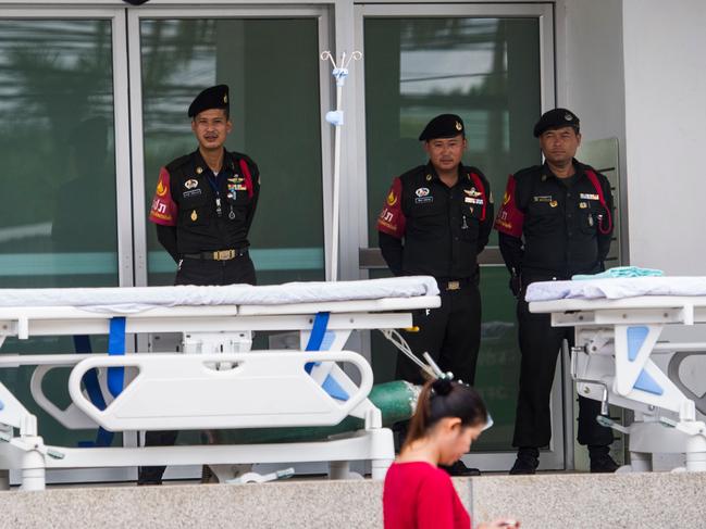 Thai Police stand in front of the hospital in Chiang Rai. The rescued boys are undergoing extensive tests to see if they have contracted a variety of deadly infections. Picture: AFP