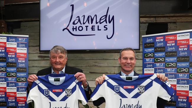 Canterbury Bulldogs sponsor launch with chief executive Andrew Hill at the Twin Willows Hotel, Bass Hill. Andrew holds the new Bulldogs jersey with Laundy Hotels owner Arthur Laundy. Picture: Brett Costello