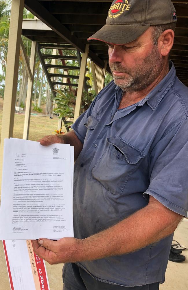 Eagleby resident Mick Herse with the letter he received in January.