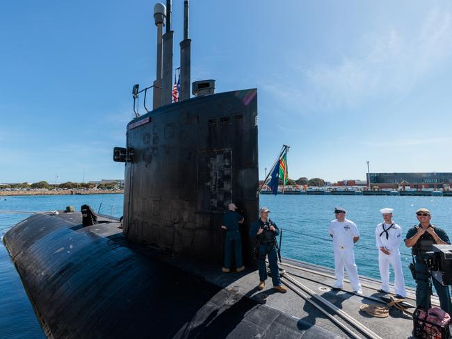 Crew members are seen working onboard the USS Asheville, a Los Angeles-class nuclear powered fast attack submarine, during a visit to HMAS Stirling, Western Australia on Tuesday, March 14, 2023. Picture: NCA NewsWire / pool / Richard Wainwright