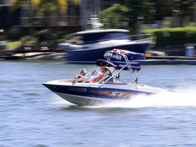 Boats and Jet skiers were out aplenty on the Gold Coast canals, all celebrating Australia Day Photo: Scott Powick