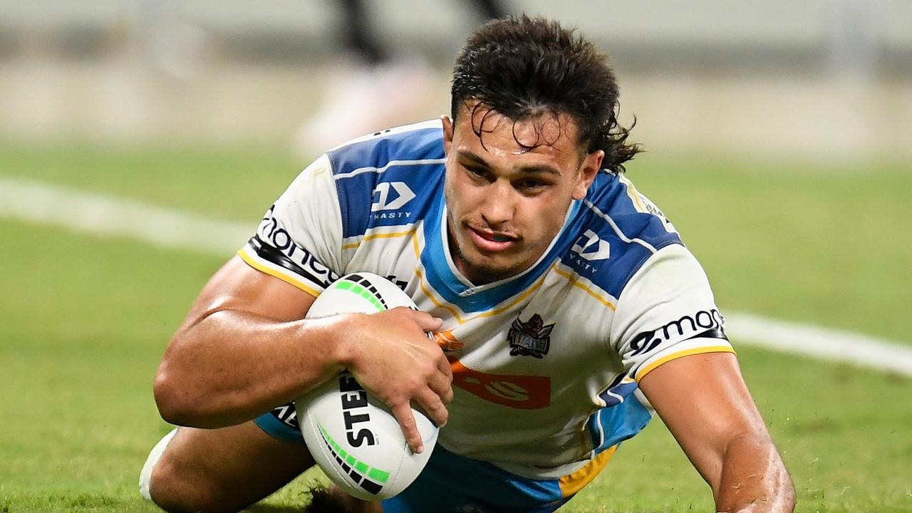 Tino Fa'asuamaleaui is keen to stay loyal to the Titans despite interest from expansion rivals the Dolphins.