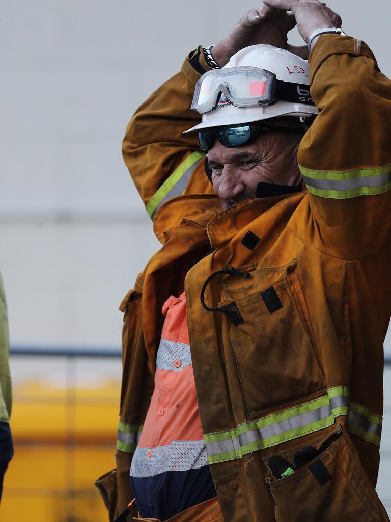 Lachlan Fire: Tasmania Fire Service personnel at Lachlan Fire Station. Picture: LUKE BOWDEN