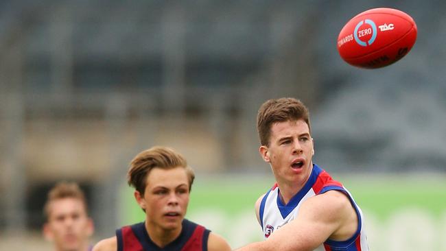 Jack Higgins snaps a goal for Oakleigh Chargers. Picture: Getty Images