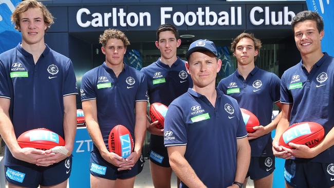 The Carlton draft class of 2015 with coach Brendon Bolton from left to right: Harry McKay, Charlie Curnow, Jacob Weitering, David Cuningham and Jack Silvagni. Picture: Hamish Blair