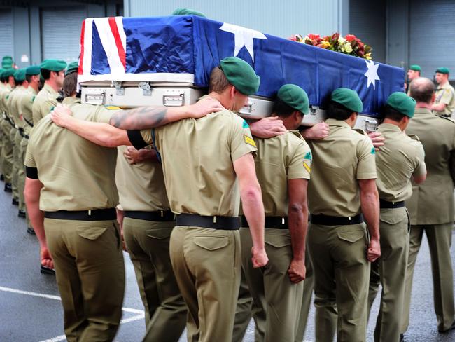 The bearer party carries the casket of Corporal Cameron Baird during the Repatriation Ceremony held at RAAF Base Richmond on June 29, 2013. Picture: Jake Sims / Australian Defence Force.