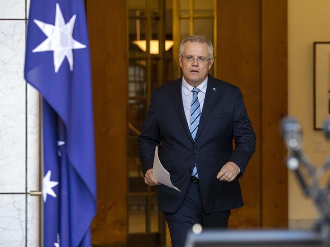 Australian Prime Minister Scott Morrison arrives to give his first press conference in the Prime Minister's Courtyard at Parliament House in Canberra, where he announced his new ministry. Picture by Sean Davey.