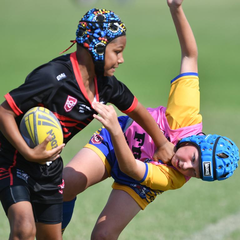 Teams play for Laurie Spina Shield at Brothers at Kirwan. Mackay Norths Kaihlum Savney-Boah and Mt Isa's Coby Lewry. Picture: Evan Morgan