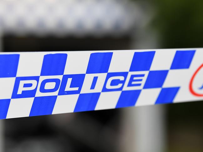 Police tape is seen after an incident at the Reservior Police station in Melbourne, Thursday, February 20, 2020. A car has rammed into the Reservior Police station. (AAP Image/James Ross) NO ARCHIVING