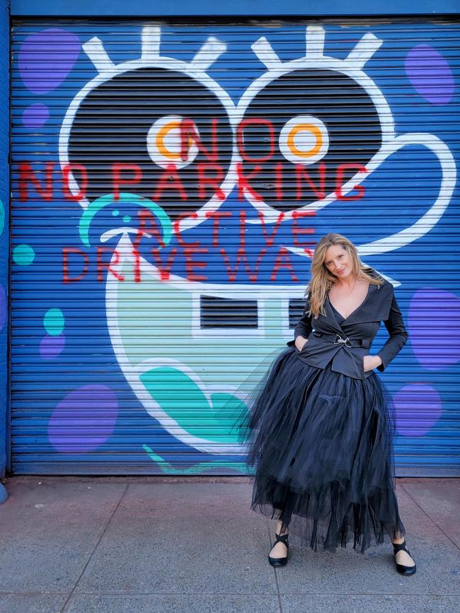 Sowden poses in front of street art in Brooklyn in a Pony Black tutu. Picture: Jennifer Mitchell