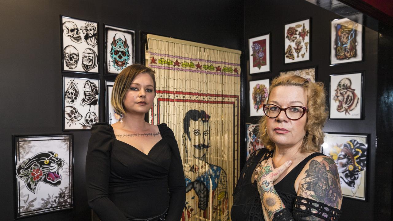 White Lion Custom Tattoo artists Mellisah Johns (left) and owner Kym Hammond are concerned about proposed changes to laws for the professional industry in Queensland. Picture: Kevin Farmer