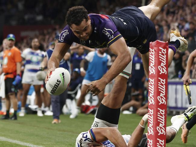 MELBOURNE, AUSTRALIA - MARCH 16: Xavier Coates of the Storm scores the match winning try during the round two NRL match between Melbourne Storm and New Zealand Warriors at AAMI Park, on March 16, 2024, in Melbourne, Australia. (Photo by Daniel Pockett/Getty Images)