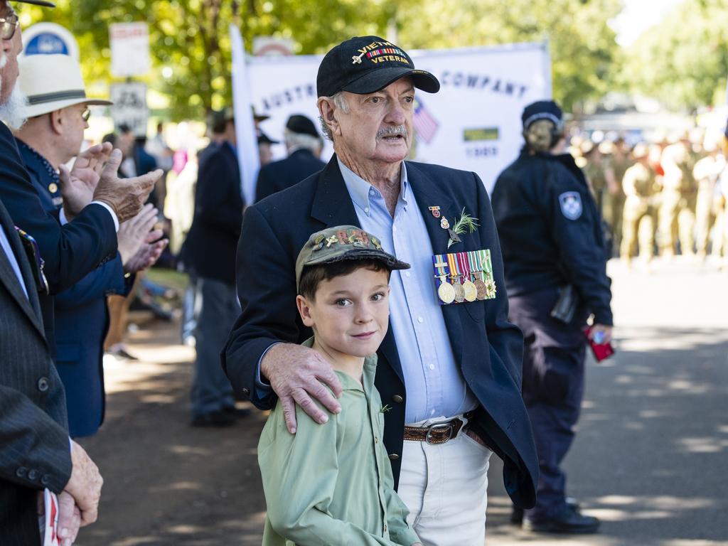 Traves Moloney marched with his granddad Mike Moloney with the Vietnam veterans after the Anzac Day Toowoomba Mid-Morning Service of Remembrance at the Mothers' Memorial, Tuesday, April 25, 2023. Picture: Kevin Farmer
