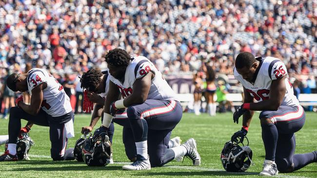 Houston Texans players kneeling today. Pic: AFP