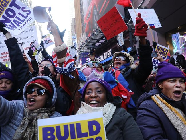 Activists, politicians and citizens alike reacting to comments made by the President that appeared to denigrate Haiti and African nations during a meeting on the immigration issue. Picture: Spencer Platt/Getty Images/AFP