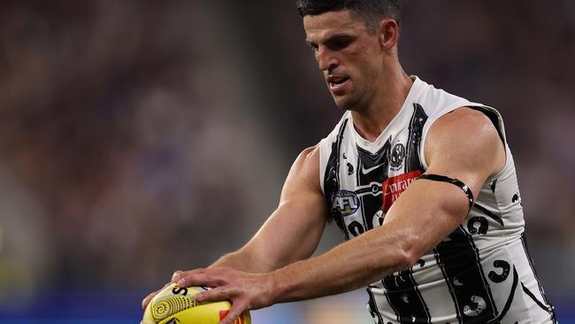 PERTH, AUSTRALIA - MAY 24: Scott Pendlebury of the Magpies in action during the round 11 AFL match between Walyalup (the Fremantle Dockers) and Collingwood Magpies at Optus Stadium, on May 24, 2024, in Perth, Australia. (Photo by Paul Kane/Getty Images)