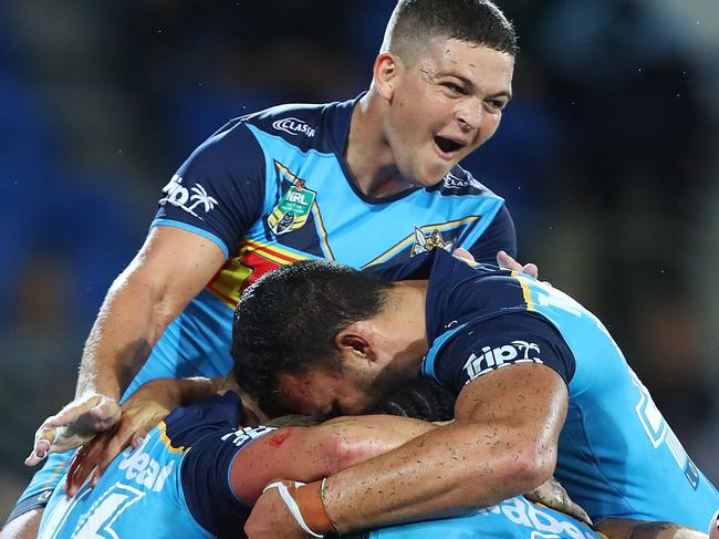 GOLD COAST, AUSTRALIA - MARCH 11:  Ash Taylor celebrates after Konrad Hurrell of the Titans scores a try to win the round one NRL match between the Gold Coast Titans and the Canberra Raiders at Cbus Super Stadium on March 11, 2018 in Gold Coast, Australia.  (Photo by Chris Hyde/Getty Images)