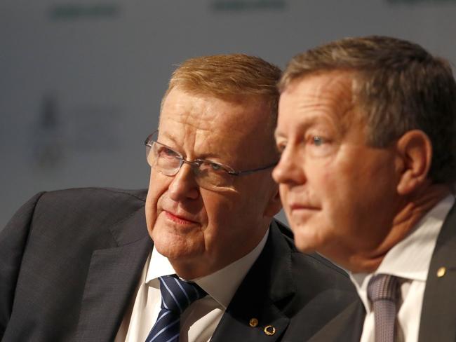 AOC President John Coates and Chief Executive Officer Matt Carroll talk during the Australian Olympic Committee Annual General Meeting in Sydney, Saturday, April 28, 2018. (AAP Image/Daniel Munoz) NO ARCHIVING