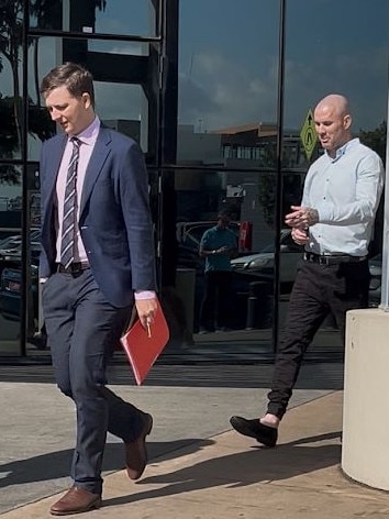 Defence solicitor Daniel Gilbert (left) leaves the Southport Courthouse with his client Mitchell Dean Sawyer (right). Picture: Emily Walker