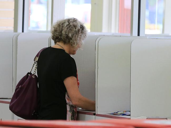 casting their vote at the pre-poll booth, Mulgrave rd.PICTURE: JUSTIN BRIERTY