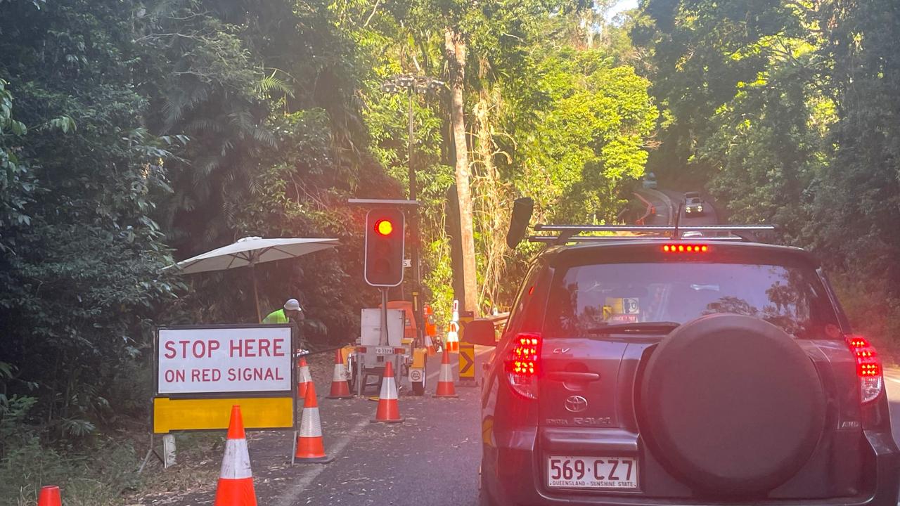 Mobile traffic lights have been in operation at the Streets Creek crossing since December 2023 when landslides damaged the road. Picture: Peter Carruthers