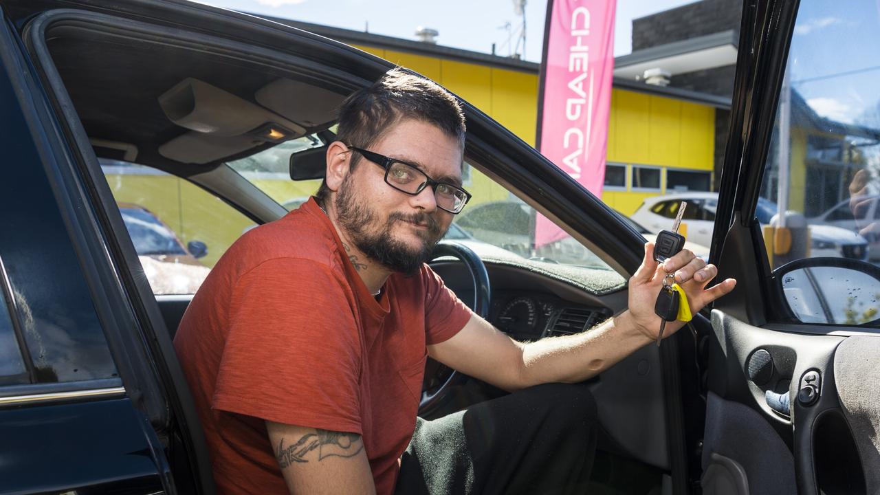 GENEROUS GIFT: With his Cheap Cars Toowoomba donation, a 2001 Holden Astra, is Brendon McGurgan. Picture: Kevin Farmer. Picture: Kevin Farmer